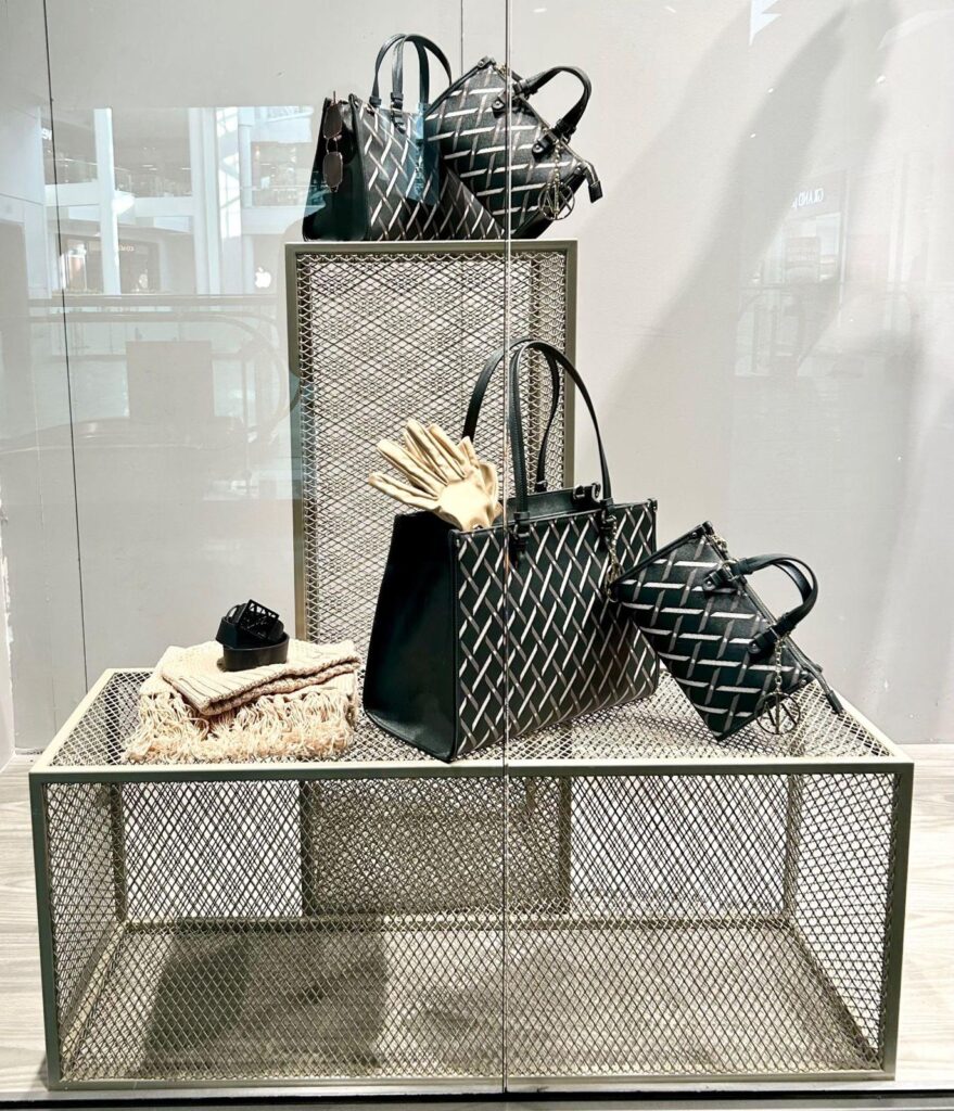 Window riser with handbags and gloves