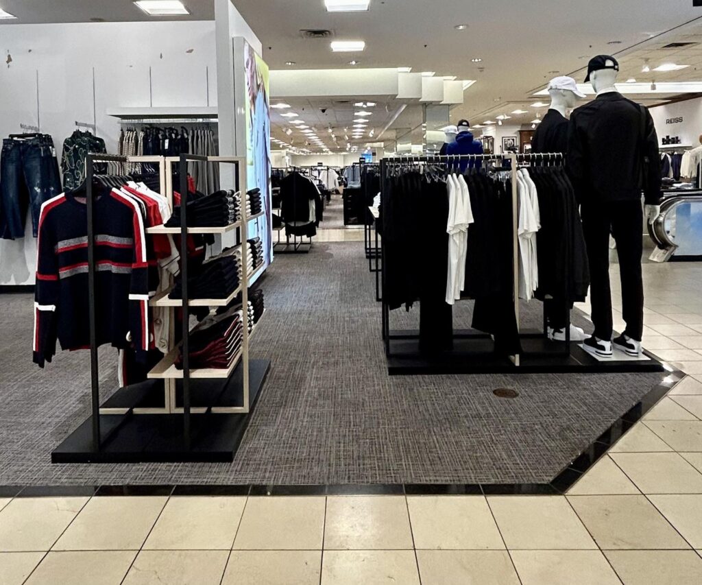 Concession outfitting racks with mannequins